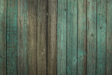Fototapeta na wymiar old wooden fence blue color for background