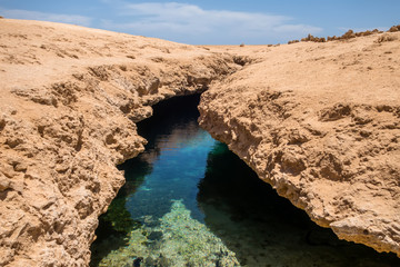 Desert earth crack red sea bay.