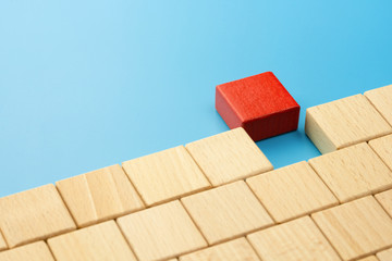 Wooden blocks connected on a blue background, Business team building concept