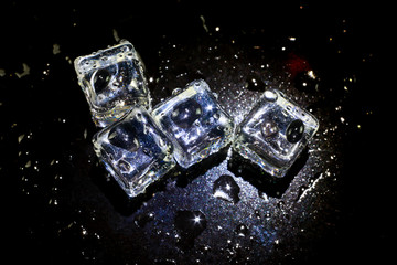 ice cubes on black background.