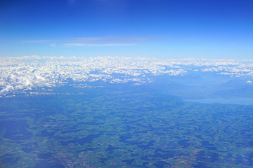 Aerial view of the Alps Mountains covered with snow over France and Switzerland