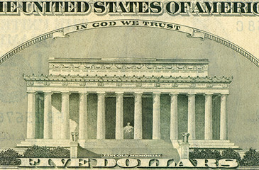 Detail of the bill of five dollars closeup