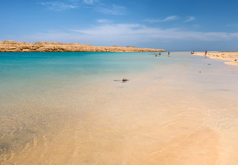 Crystal clear Red Sea sand beach sky summer day