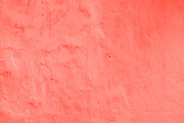 Living Coral color of the Year 2019 abstract background. plastered wall with decorative plaster main trend of the season