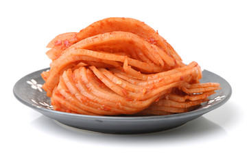 sliced radish kimchi  on white background