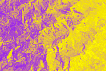 Fototapeta na wymiar Holographic color wrinkled foil. Trendy texture. Neon colored texture for your design. Proton Purple and yellow background.