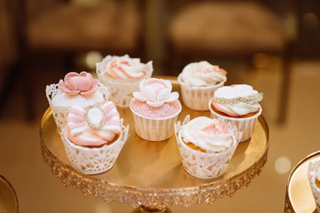 Candy bar. Table with sweets, buffet with cupcakes, candies, dessert