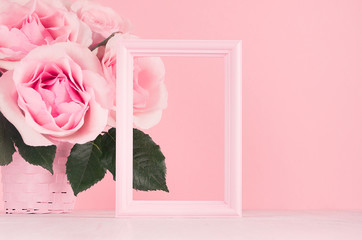 Modern fashion Valentine days background - blank frame for advertising and rich pink roses on white wood board, copy space.