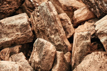 Close up of big brown stones. Group of granite rock stones. Mountain texture and background. Nature concept.