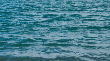 Obraz premium closeup of little waves on the lake surface texture