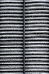 dirty texture of air filter for car, automotive spare part in plastic case