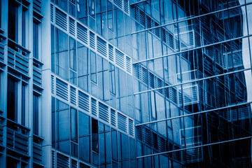 Naklejka na ściany i meble Urban abstract - windowed corner of office building.