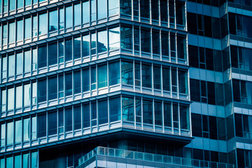 Urban abstract - windowed corner of office building.