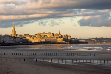 The morning light on the Plage du Sillon and walled city. Saint Malo , France, Ille et Vilaine,...