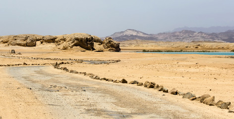 Fototapeta na wymiar Sinai Head of Lion Rock mountain rock formations sandy plateaus,