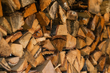 Beautiful view of stacked wood in a beautiful sunny day, countryside.