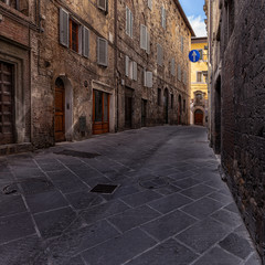 Fototapeta premium Old alley in Tuscany Italy