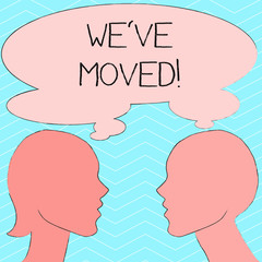 Writing note showing We Ve Moved. Business concept for having strong feelings sadness or sympathy has said or done Silhouette Sideview Profile of Man and Woman Thought Bubble