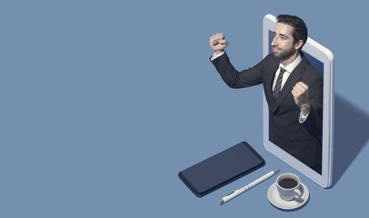 Successful businessman in a smartphone