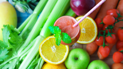 Top view of Healthy drinks  with Vegetable, Fresh fruits and Assorted fruits colorful background