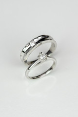 Couple diamond rings on white isolated