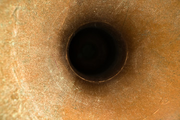 Inside the metal pipe, metallic texture tube. Perspective view