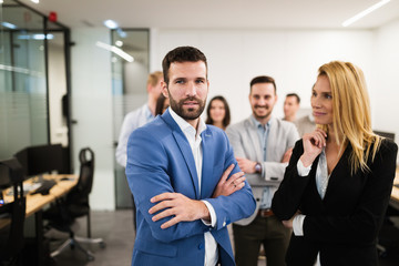 Portrait of business team posing in office