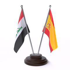 Iraq and Spain, two table flags isolated on white background. 3d image