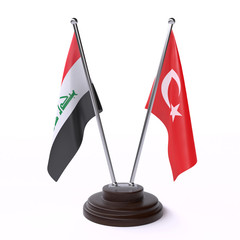 Iraq and Turkey, two table flags isolated on white background. 3d image