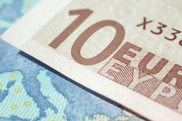 Obraz premium Fragment of ten euro bills closeup. Shalloe depth of field