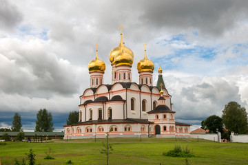 Fototapeta na wymiar Valdai Iversky Svyatoozersky Virgin Monastery for Men. Selvitsky Island, Valdai Lake. Iversky Cathedral