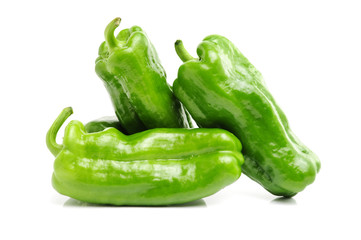 fresh green bell pepper (capsicum) on a white background