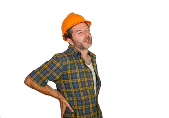 upset and exhausted construction worker or repair man wearing builder helmet complaining suffering pain in his lower back after working hard isolated on white
