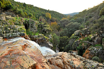 Waterfall of La Batanera or "Chorrera de los Batanes" near Fuencaliente village in Natural Park Valley of Alcudia and Sierra Madrona , province of Ciudad Real, Castilla la Mancha, Spain