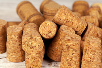 Bunch of wine corks on wooden table