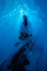 Ice Cave beneath the Matanuska Glacier in Glacier View, Alaska. Tunnel underground through glacier...