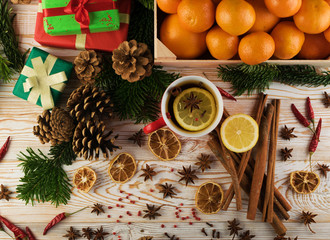 Winter drink with spices on festive new year background