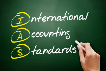 IAS - International Accounting Standards acronym, business concept on blackboard