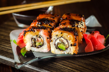 sushi rolls with red fish