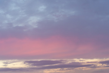 Naklejka na ściany i meble Pink gray blue sky sunset. Sky and clouds. Texture and background
