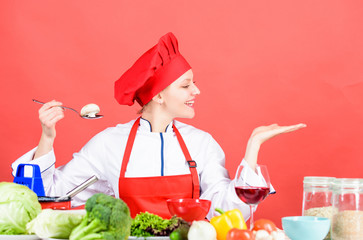 woman in cook hat. organic eating and vegetarian. Housewife. restaurant menu. Dieting. professional chef on red background. happy woman cooking healthy food by recipe. Kitchenware