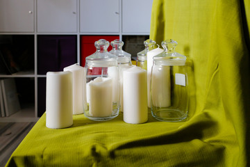The candles, glassware and green drapery.