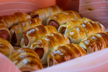 Dishes from the dough, sausages in the test