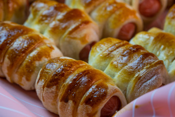 Dishes from the dough, sausages in the test
