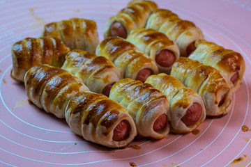 Dishes from the dough, sausages in the test