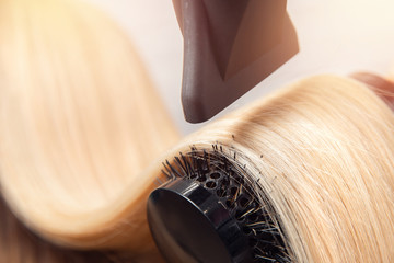 Close-up of hair dryer, concept cut salon, female stylist