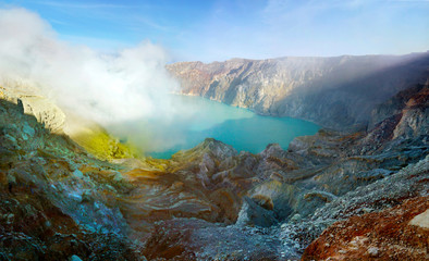 SMOKE OF SULFUR ON KAWAH IJEN VOLCANO IN JAVA ISLAND-INDONESIA