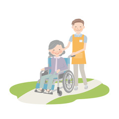 車椅子を引く男性介護士とおばあちゃん