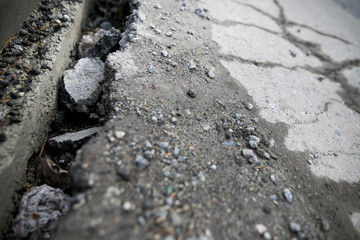 Cracked surface of an asphalt road