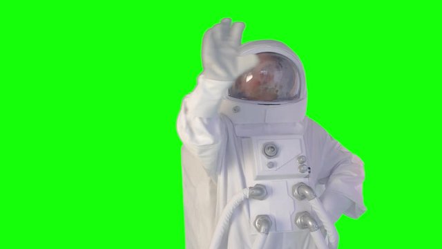 the astronaut on a green background
